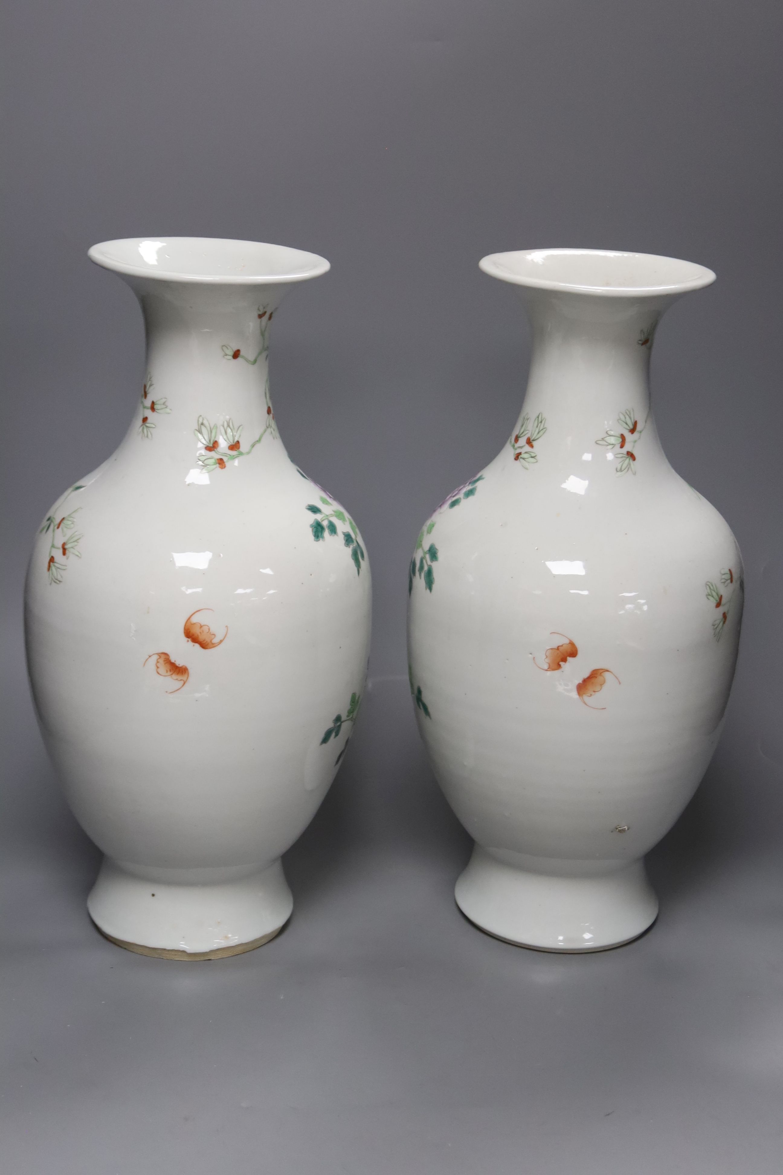 A pair of Chinese famille rose vases, height 40cm